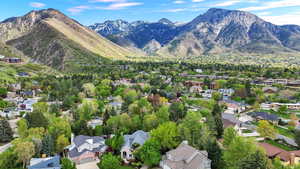 View of mountain background featuring nearby suburban area