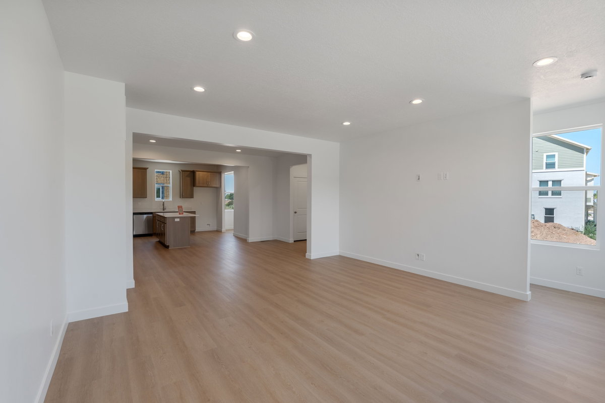 Unfurnished living room with light wood-style floors and recessed lighting