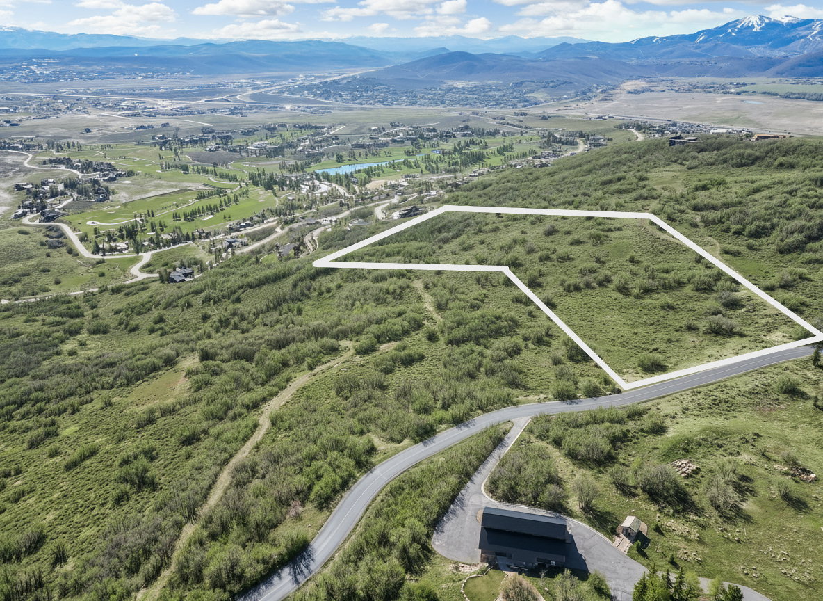 View of property location with property parcel outlined and a water and mountain view