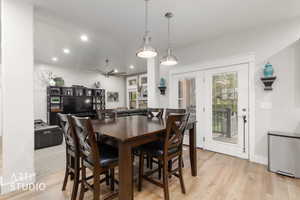 Dining room with recessed lighting, light wood-type flooring, and ceiling fan