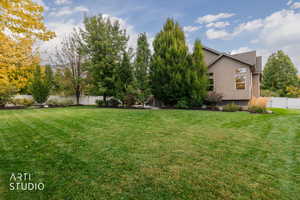 Fenced backyard with a gate