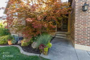 Property entrance with brick siding