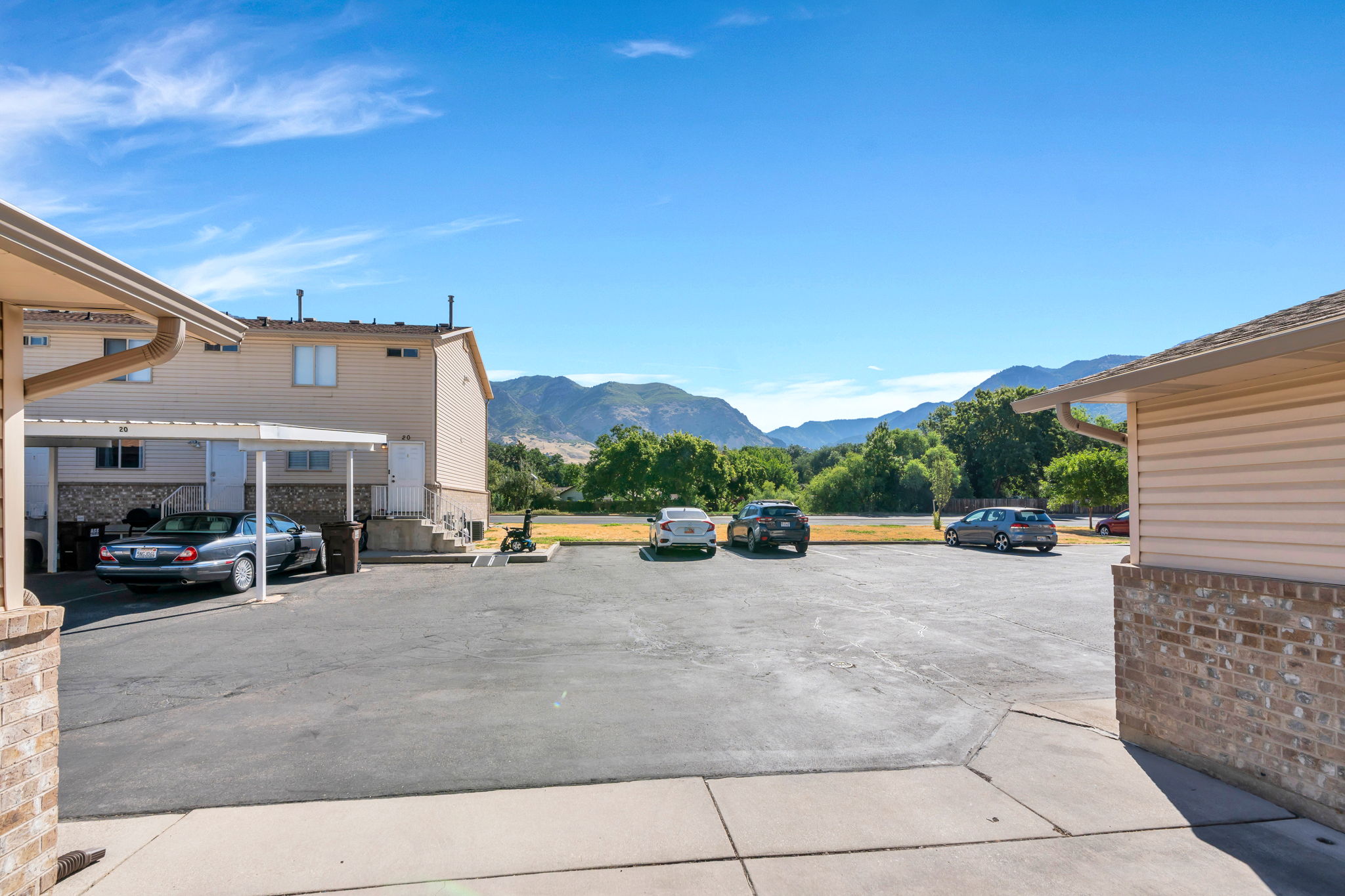Uncovered parking lot with mountain views