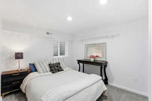 Bedroom featuring carpet floors and recessed lighting