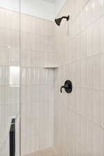 Bathroom with a tile shower
