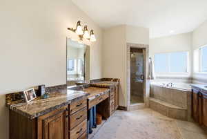 Primary bath make-up counter and cabinetry, tub & shower combo