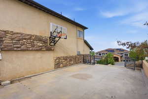 Sport court with basketball.