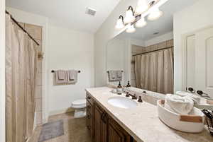 4th bathroom ensuite with tub/shower combo, and light tile floors