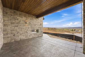 View of patio / terrace with a mountain view