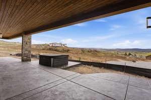 View of patio / terrace featuring a mountain view