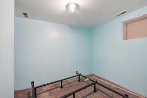 Spare room featuring carpet floors