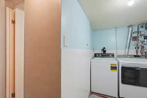 Laundry area featuring washer and clothes dryer