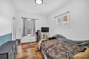 Bedroom featuring dark wood finished floors