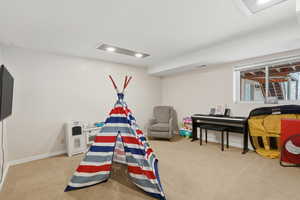 lower level large bedroom currently used as a play room