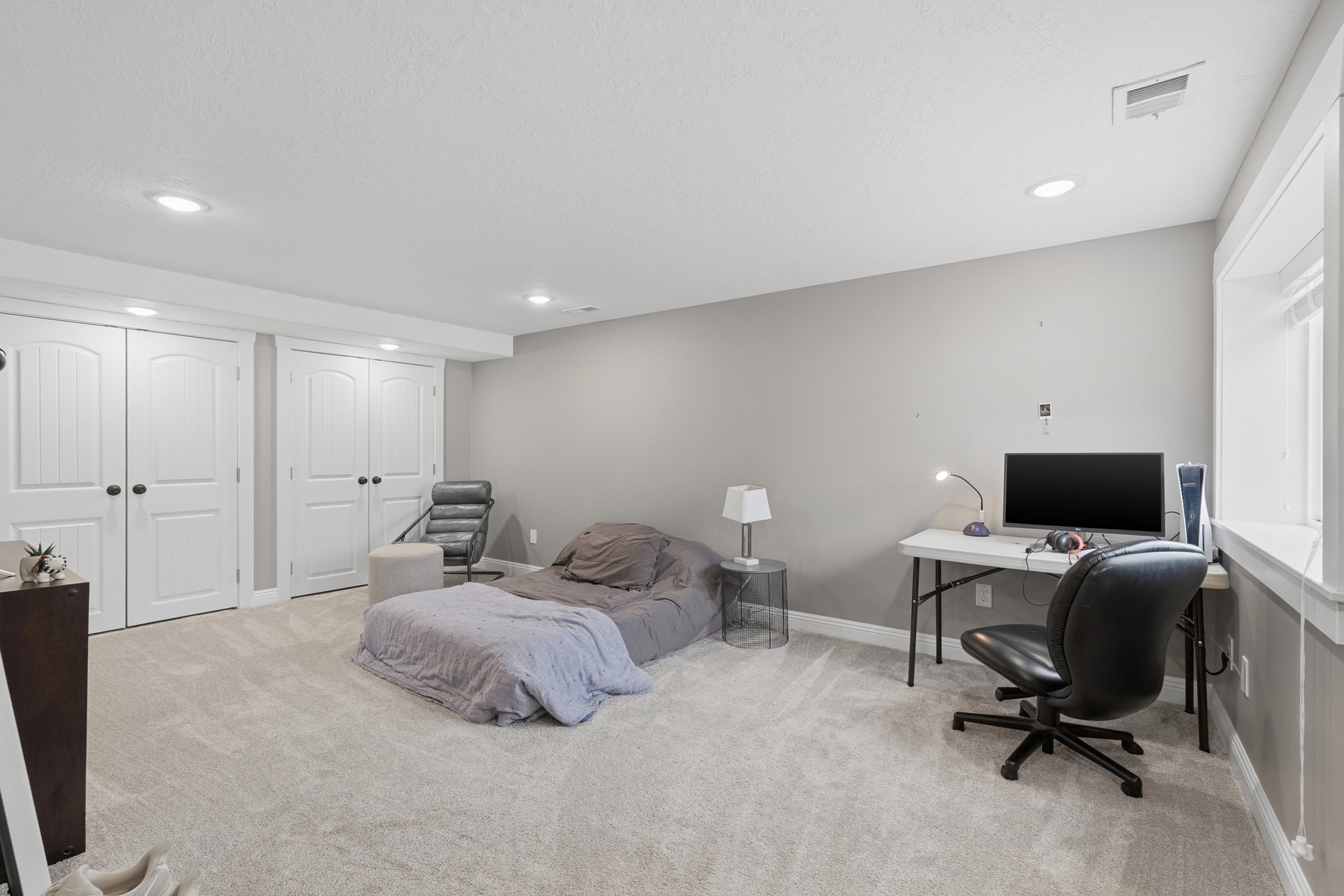 ADU lower level bedroom with 2 dbl closets