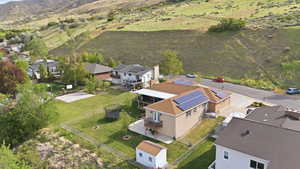 Aerial view of residential area with a mountain backdrop