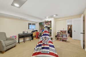 Rec room featuring light carpet and recessed lighting