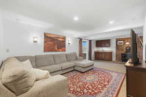 Lower level family room with gas burning stove