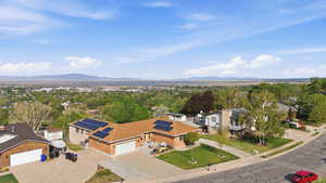 Views for Days!!  Aerial perspective of suburban area featuring a mountainous background