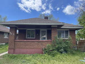 733 Ogden; brick bungalow with covered front porch!