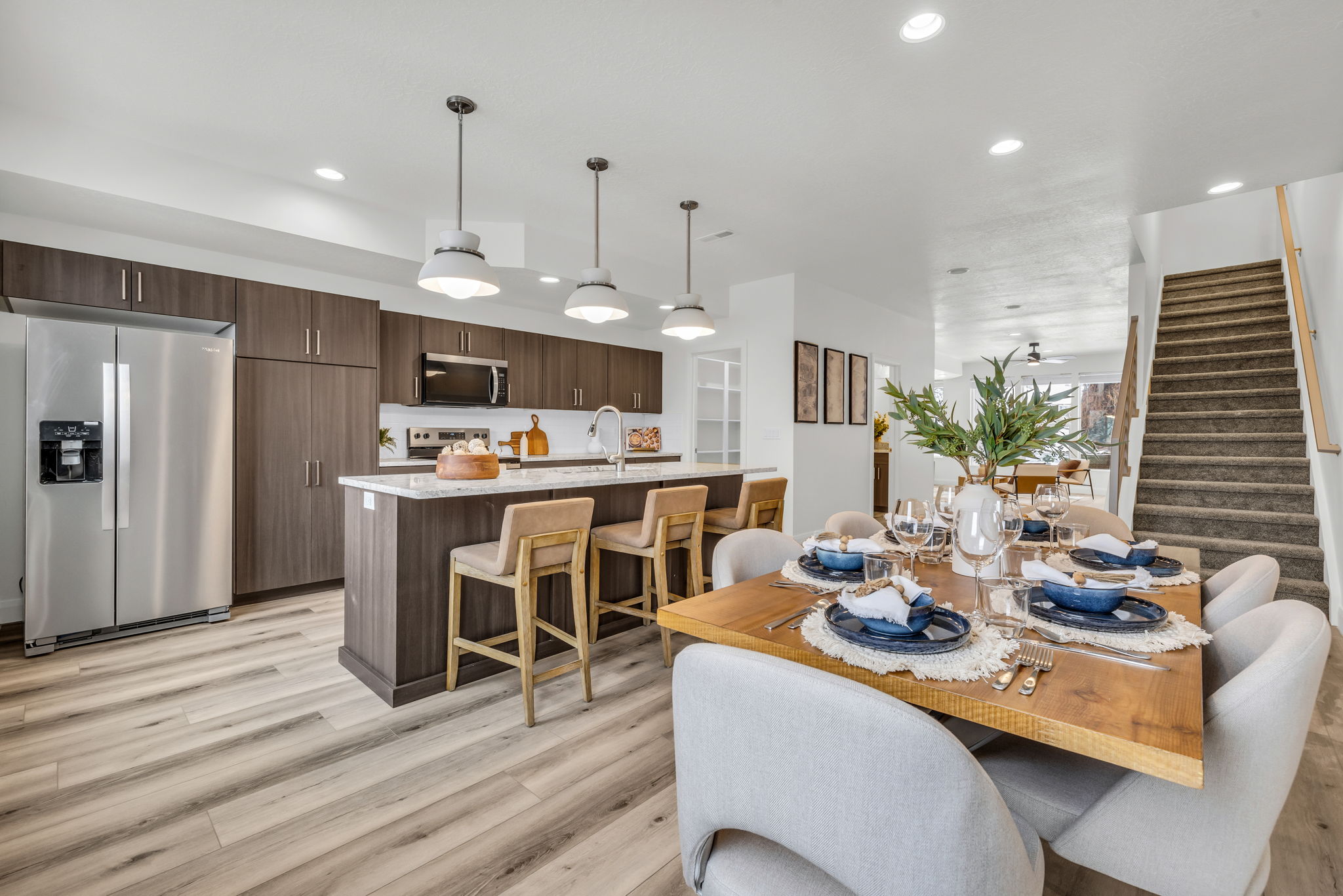 Dining space featuring light wood-style flooring and recessed lighting