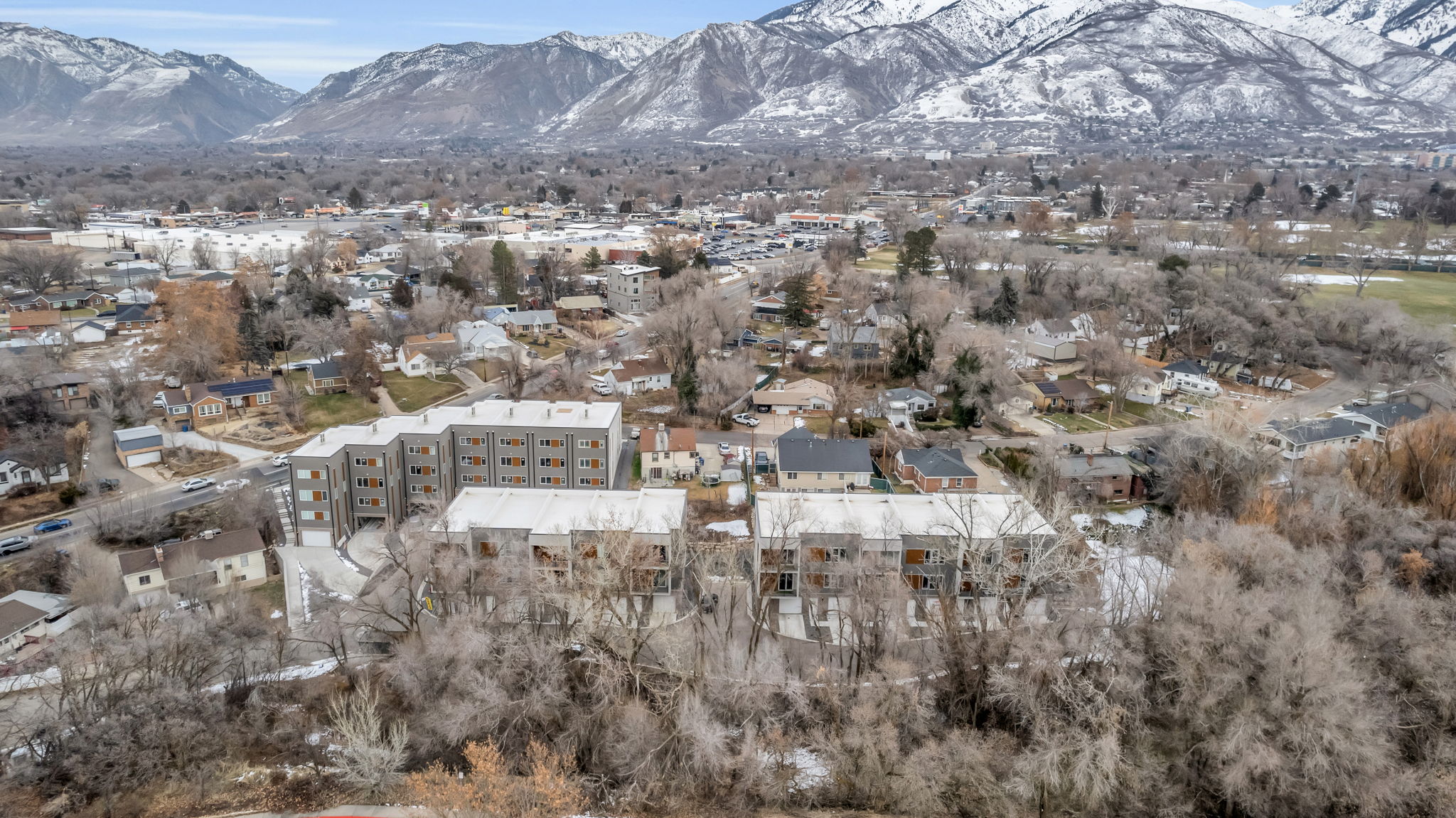 View of mountain backdrop with nearby suburban area
