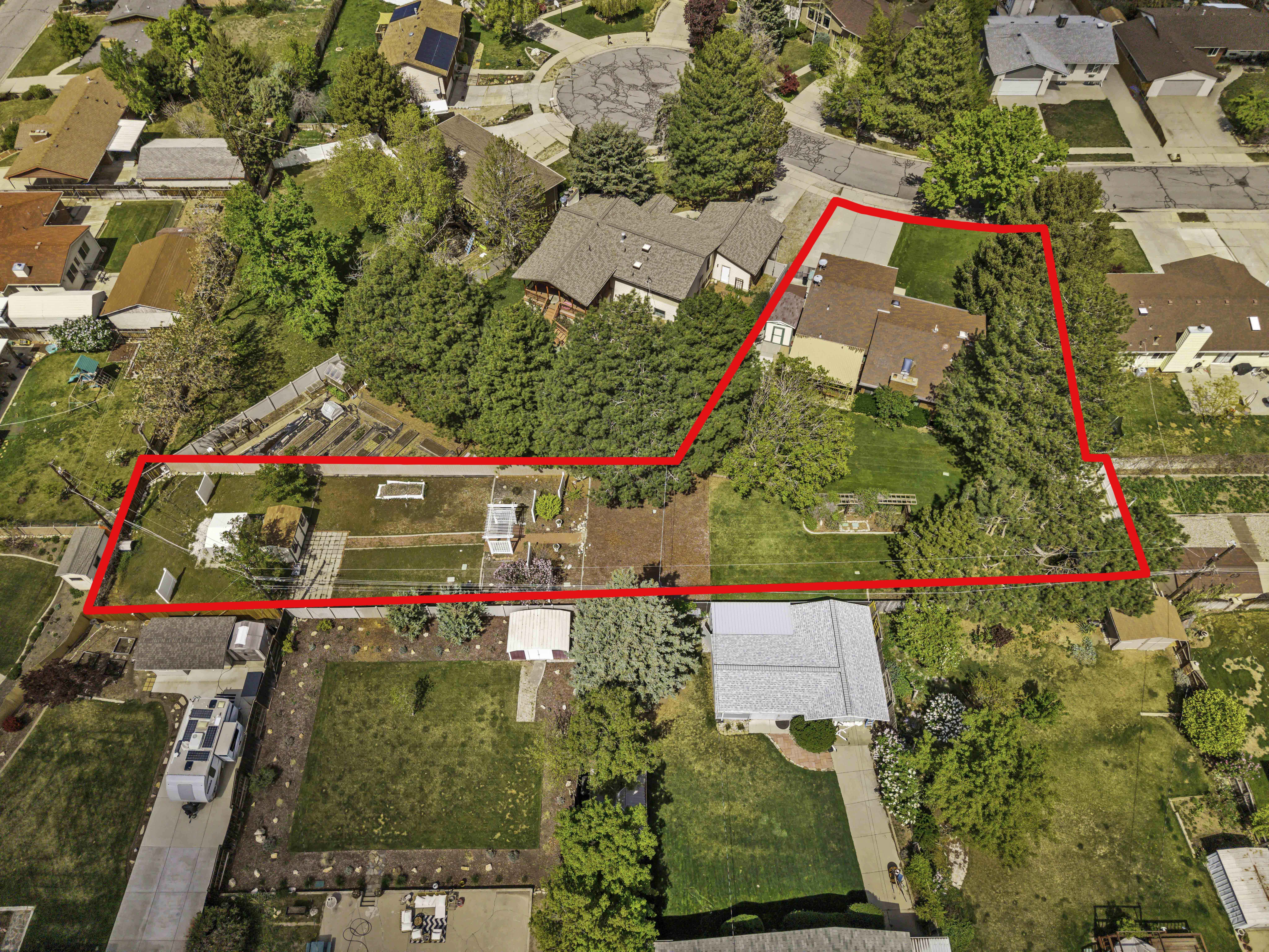 Expansive property featuring mature trees and a substantial garden area