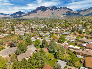 Aerial view of residential area with a mountainous background
