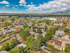 Aerial perspective of suburban area with a mountain backdrop