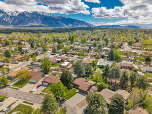 Aerial perspective of suburban area with a mountain backdrop