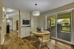 Dining space featuring light wood finished floors and baseboards