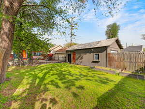 Grassy area and detached garage