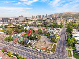 Drone / aerial view of a mountain backdrop and skyline