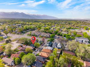 Aerial view of residential area with a mountainous background