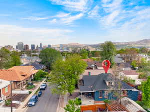 Aerial view of a mountain backdrop and close to downtown.
