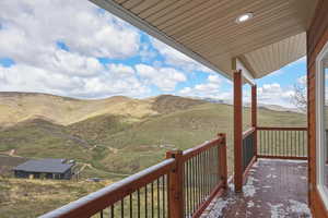 Wooden terrace with a mountain view and a rural view
