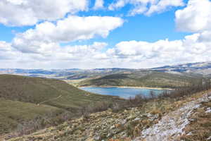 Mountain view featuring a large body of water