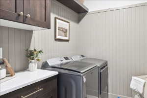 Laundry room with cabinet space and washing machine and dryer