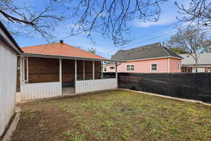View of fenced backyard