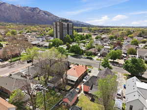 Aerial view of residential area featuring mountains