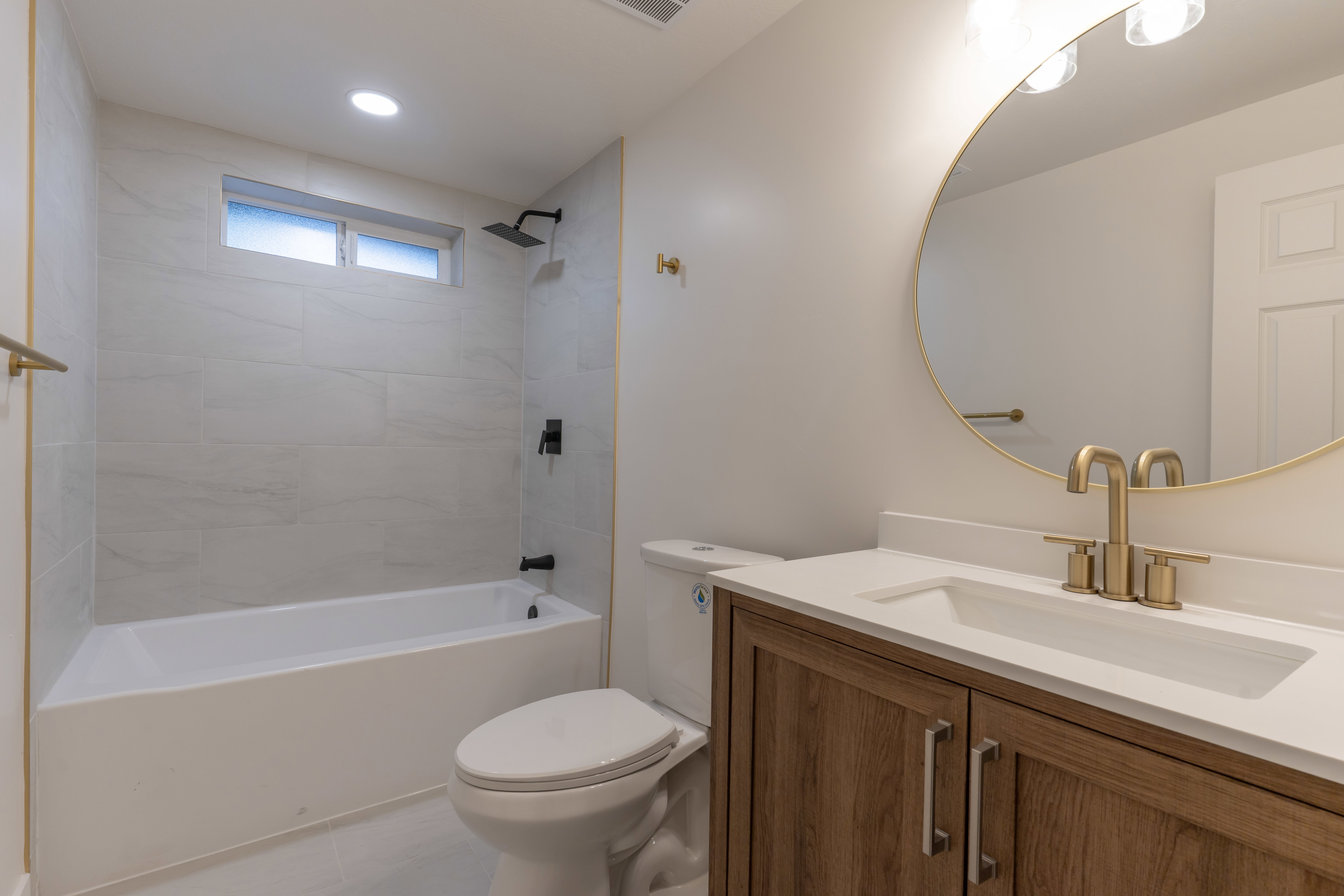Full bathroom with vanity and  shower combination
