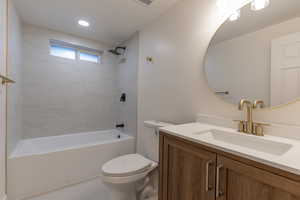 Full bathroom with vanity and  shower combination