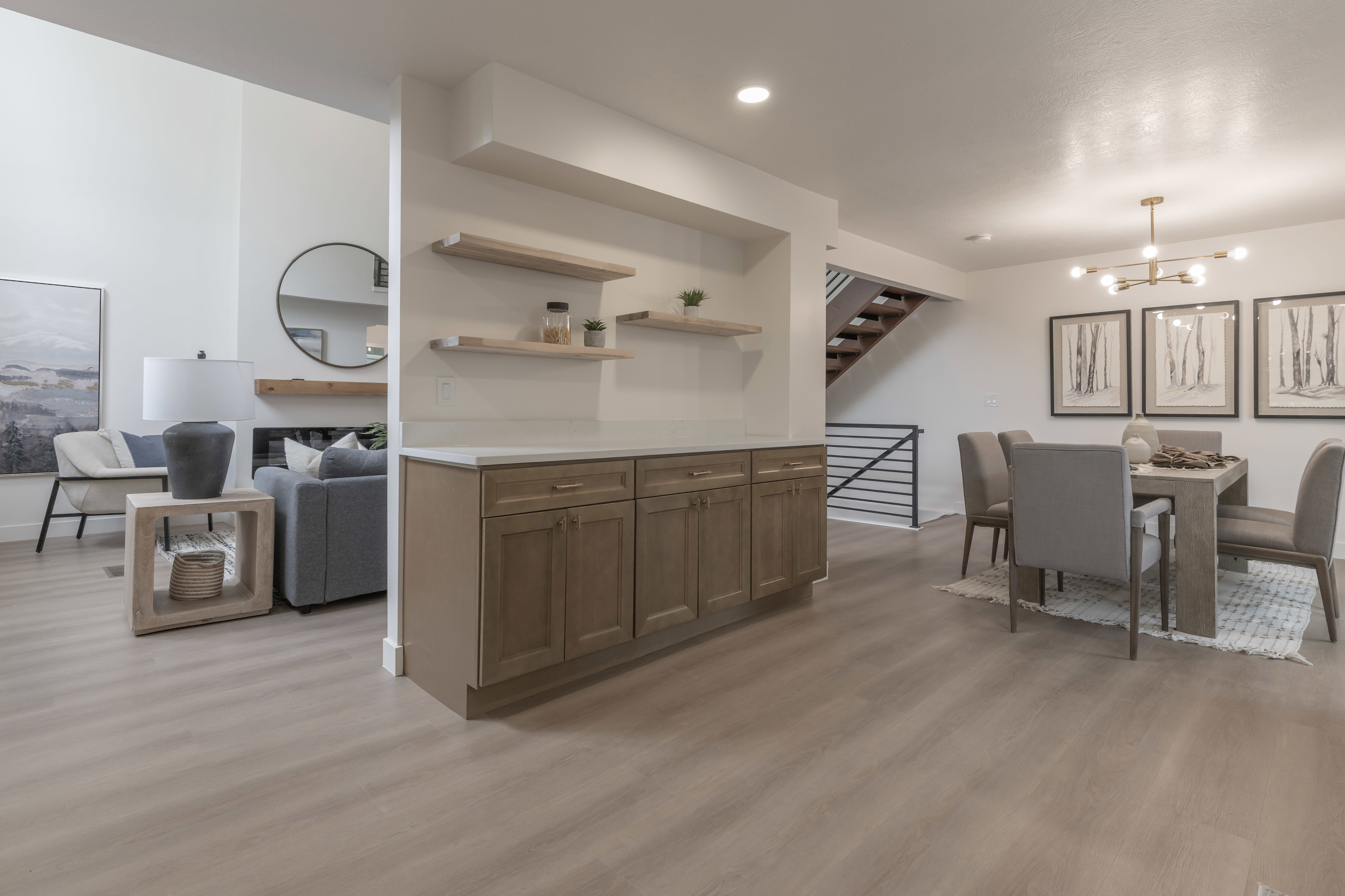 Dining room featuring suspended lighting and light wood-style flooring