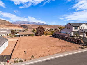 View of mountain background featuring nearby suburban area