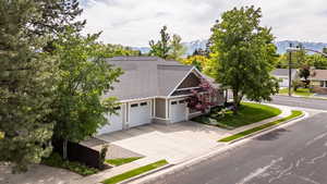 Side of home and garage/driveway