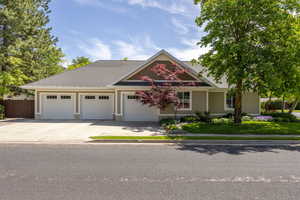 Side of home and garage/driveway
