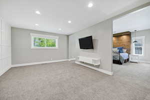 Master Bedroom with Lounge and door to deck