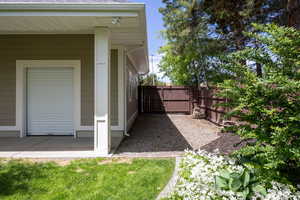 Fenced backyard with a gate for backyard RV/trailer parking