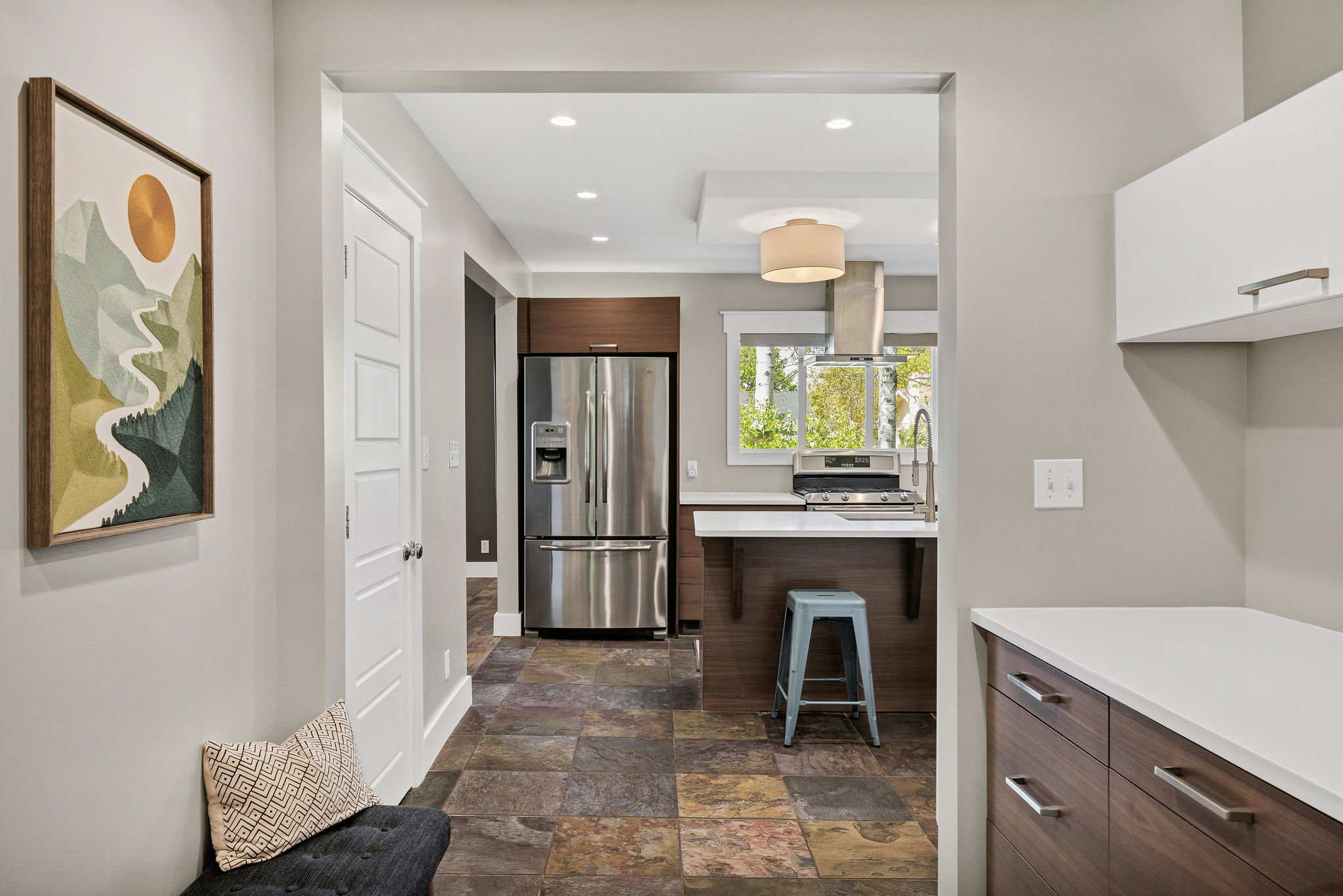 Hallway to bedrooms with Desk area