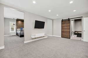 Master Bedroom with Lounge and door to deck